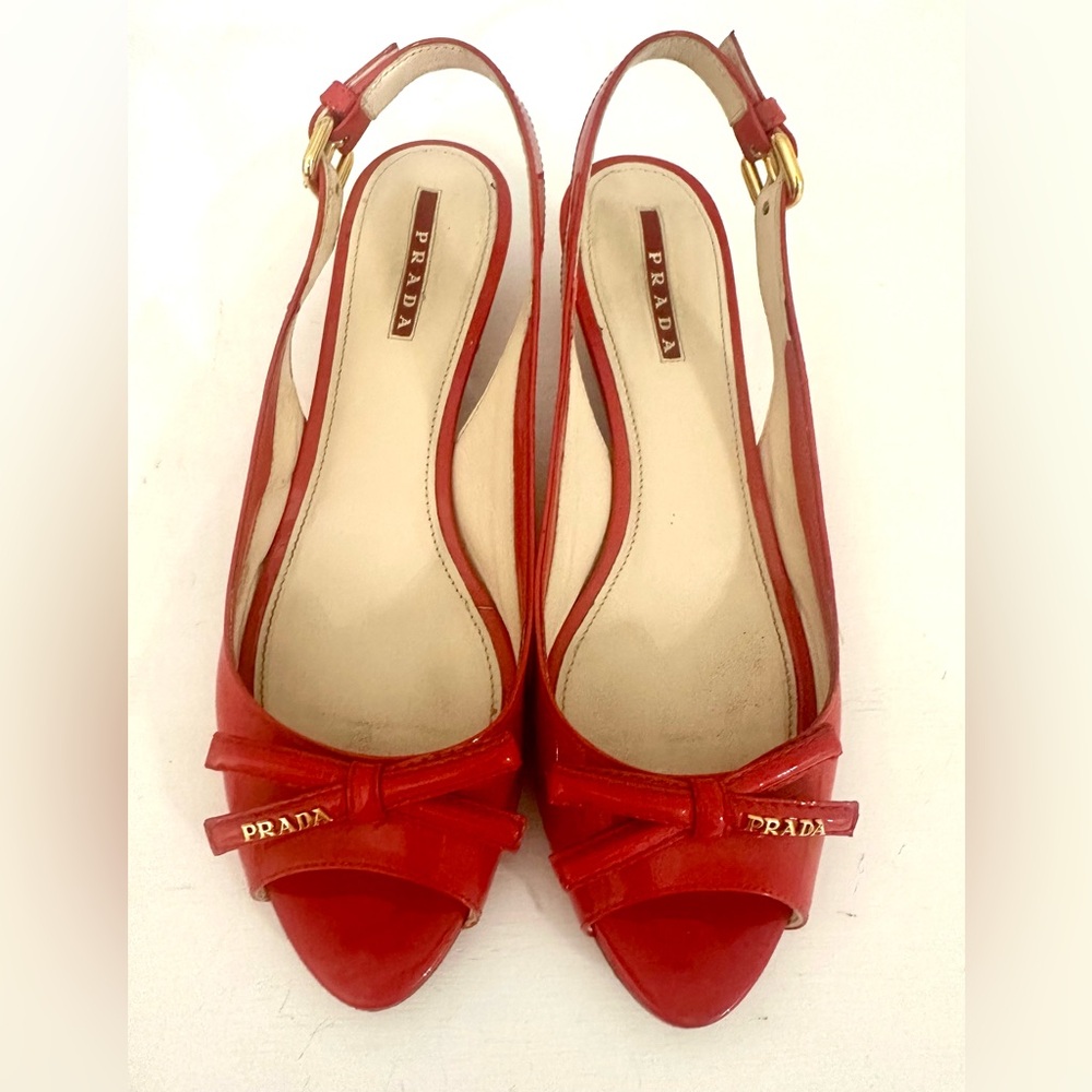 Prada Red Heels with Glossy Finish and Bow Details